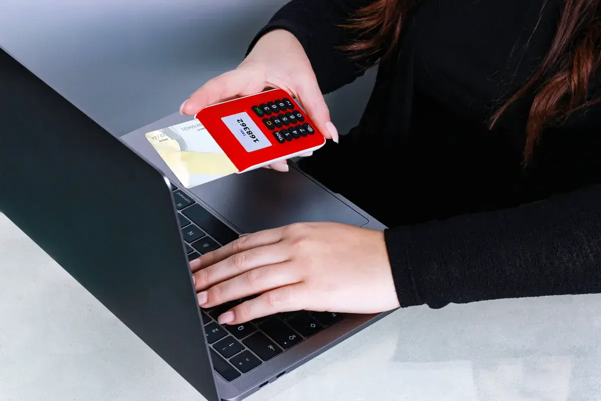 A person holding online payment for mortgage