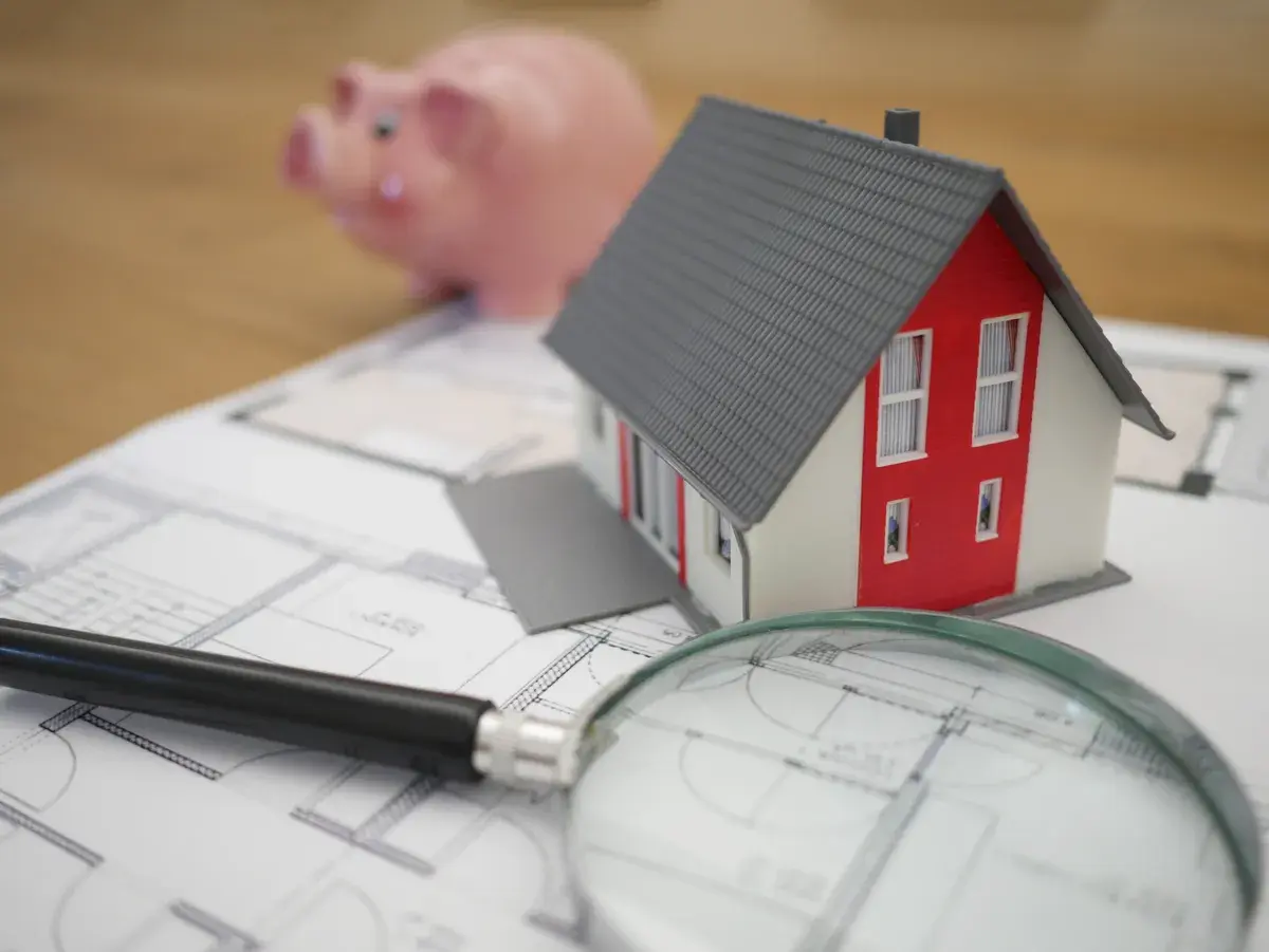 White and red wooden mortgage house