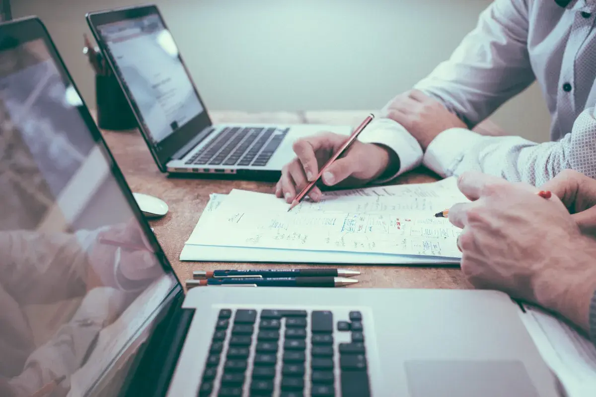 Man applying for a mortgage signing contract