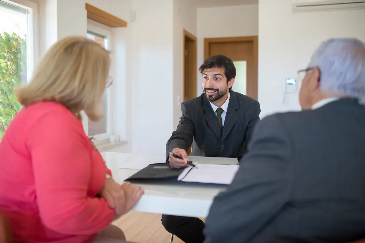 Two people consulting a mortgage broker