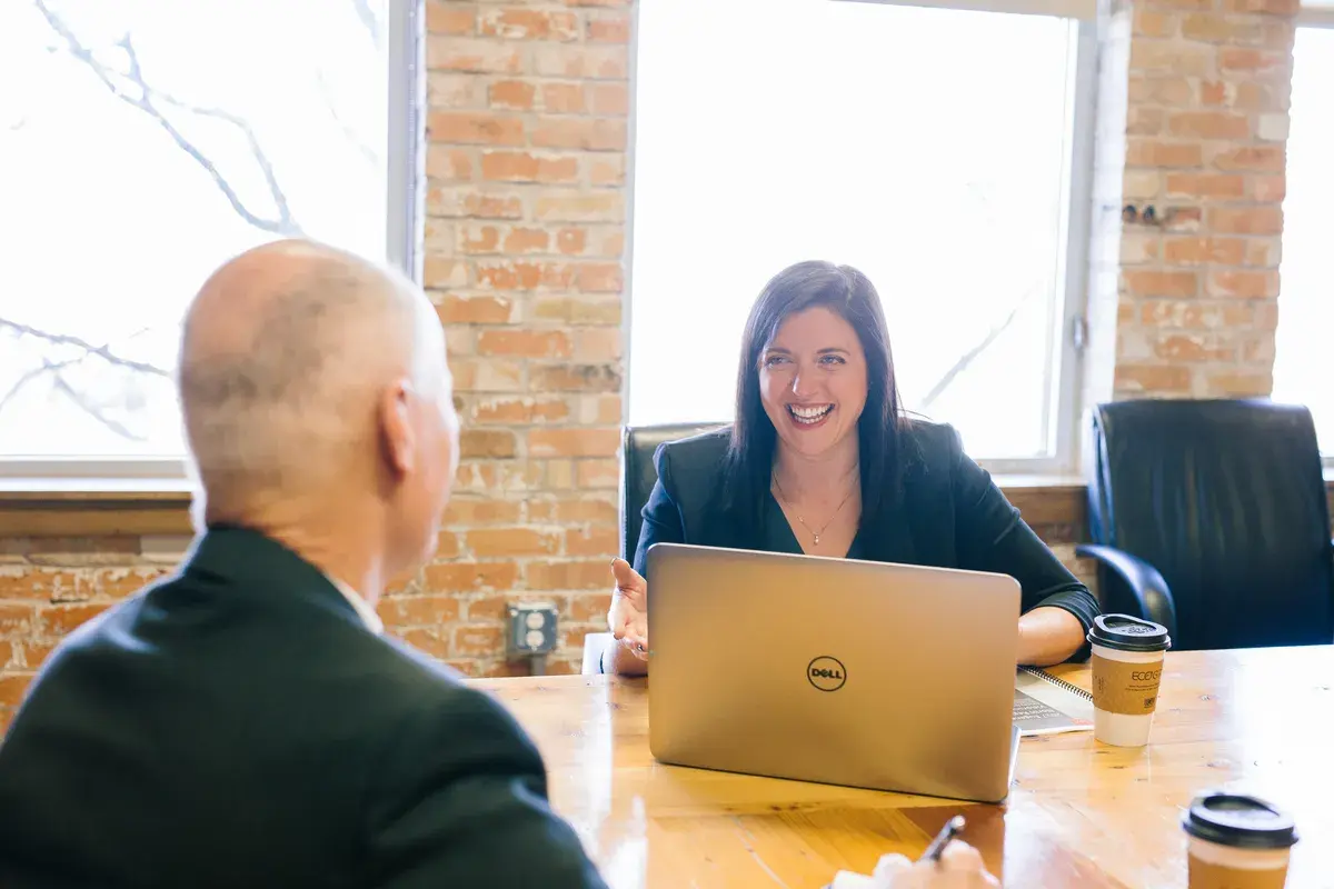 Broker asking woman questions