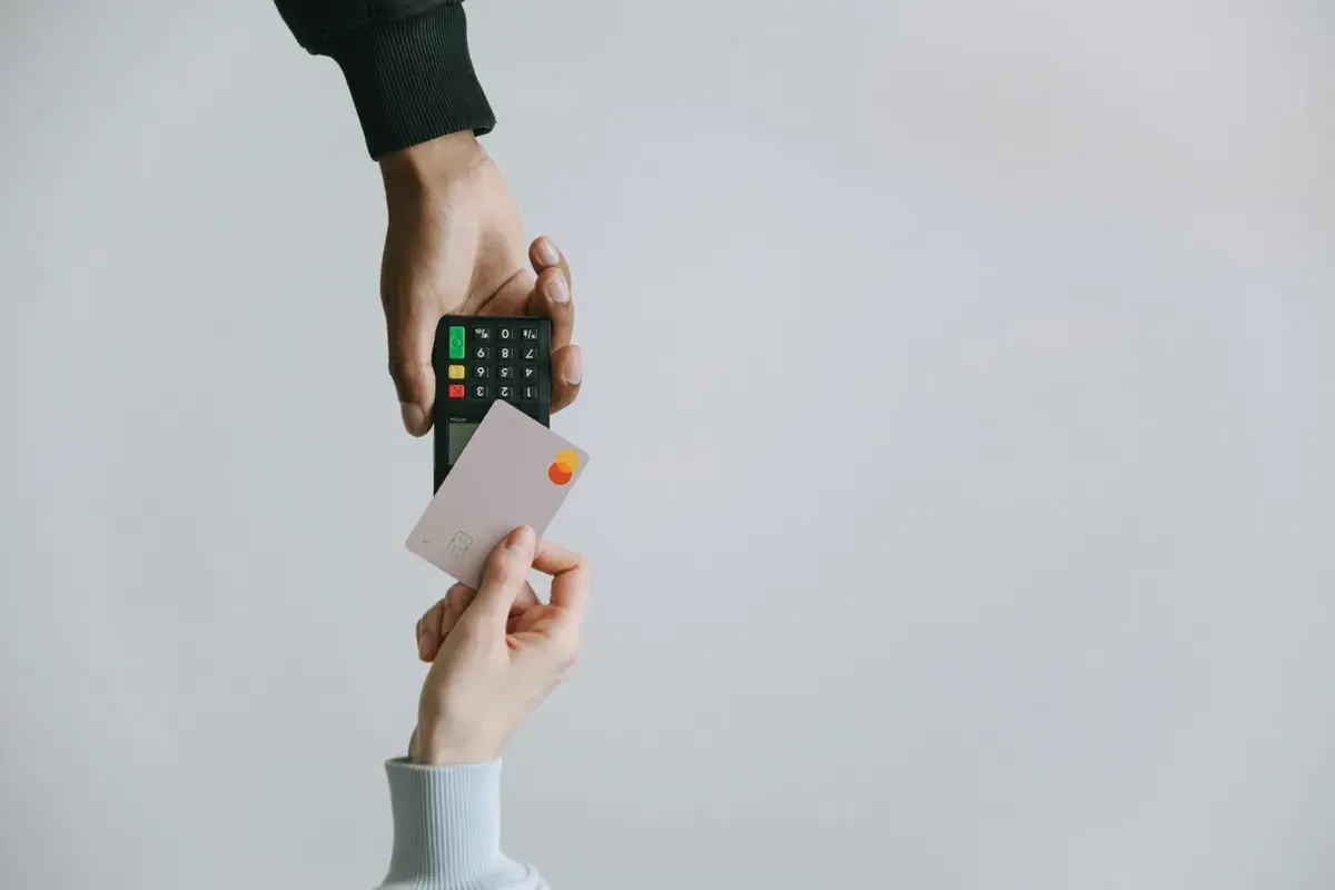 Client paying a mortgage advisor