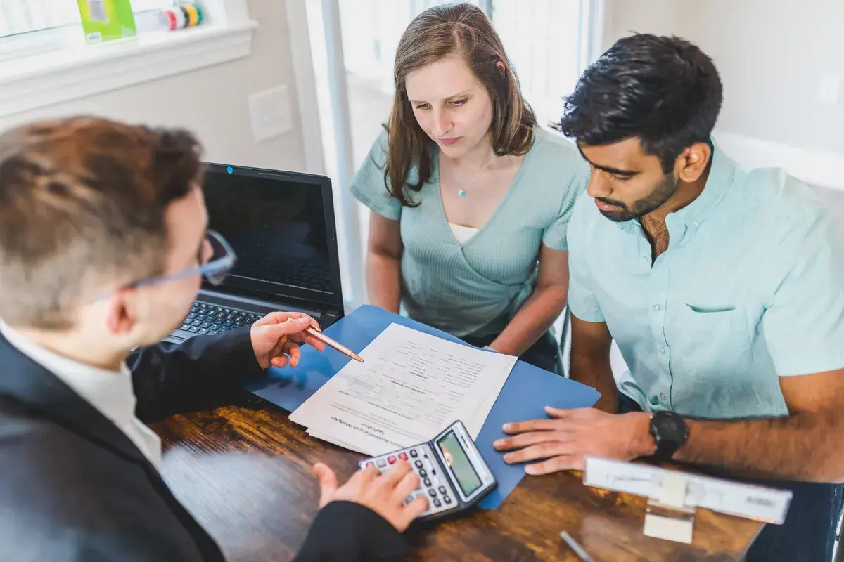 A broker discussing important matter to his client