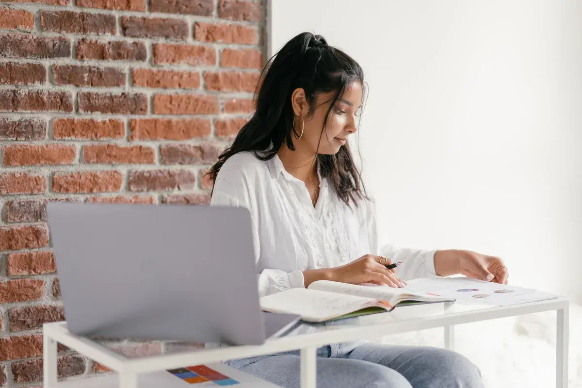 Women doing her homework about mortgage approval
