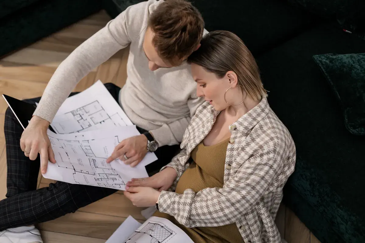 Couple looking at a mortgage blueprint