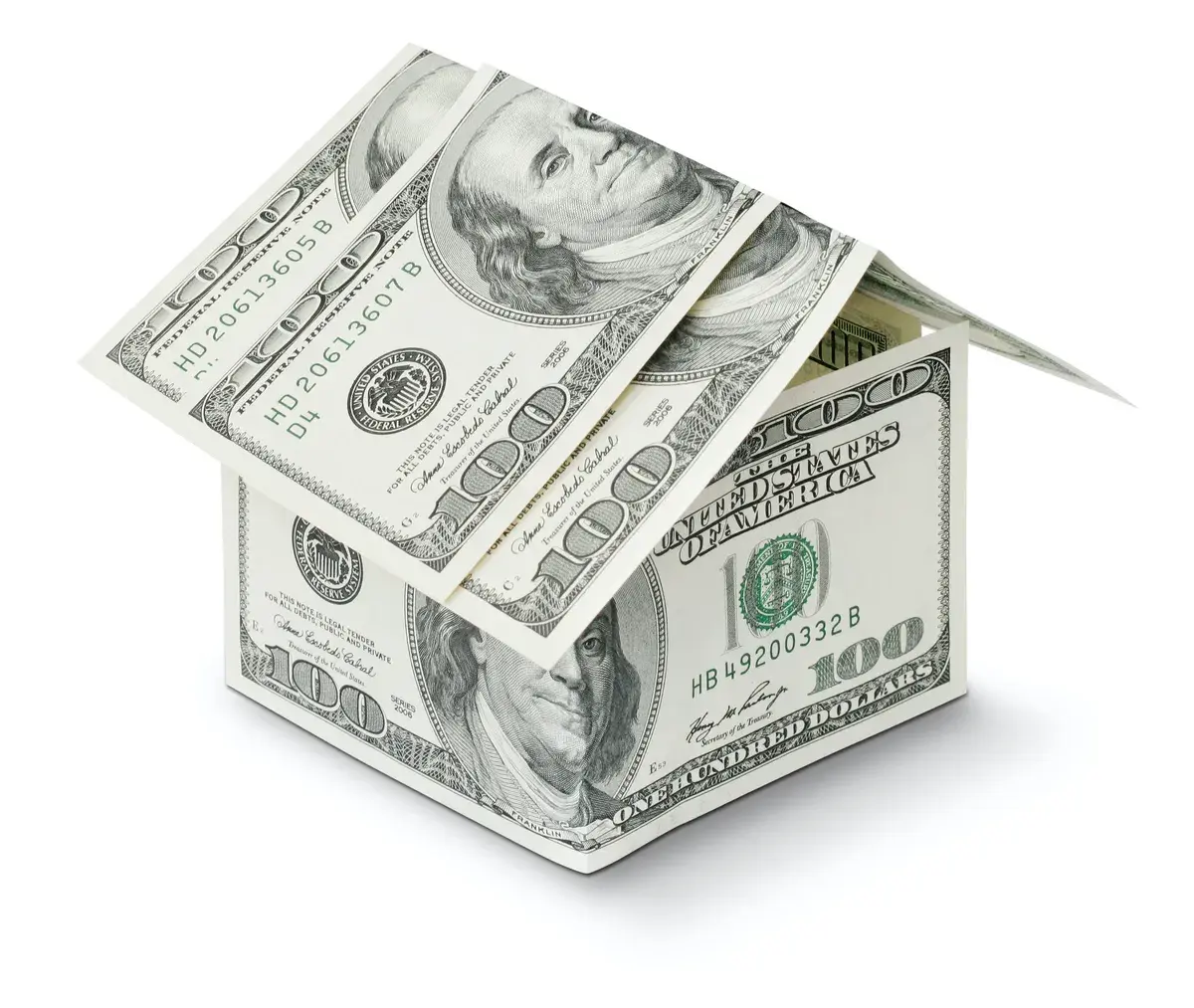 Mortgage house made out of money on a white background