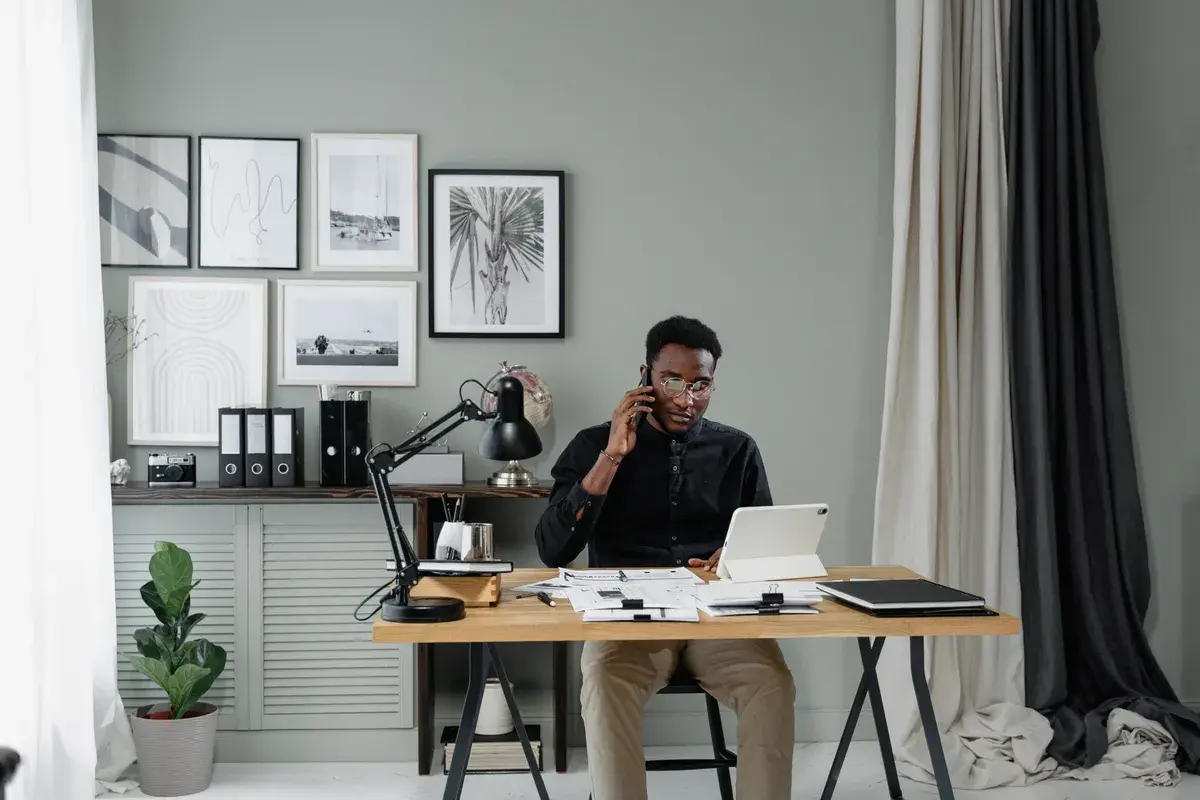 A mortgage broker in black long sleeves