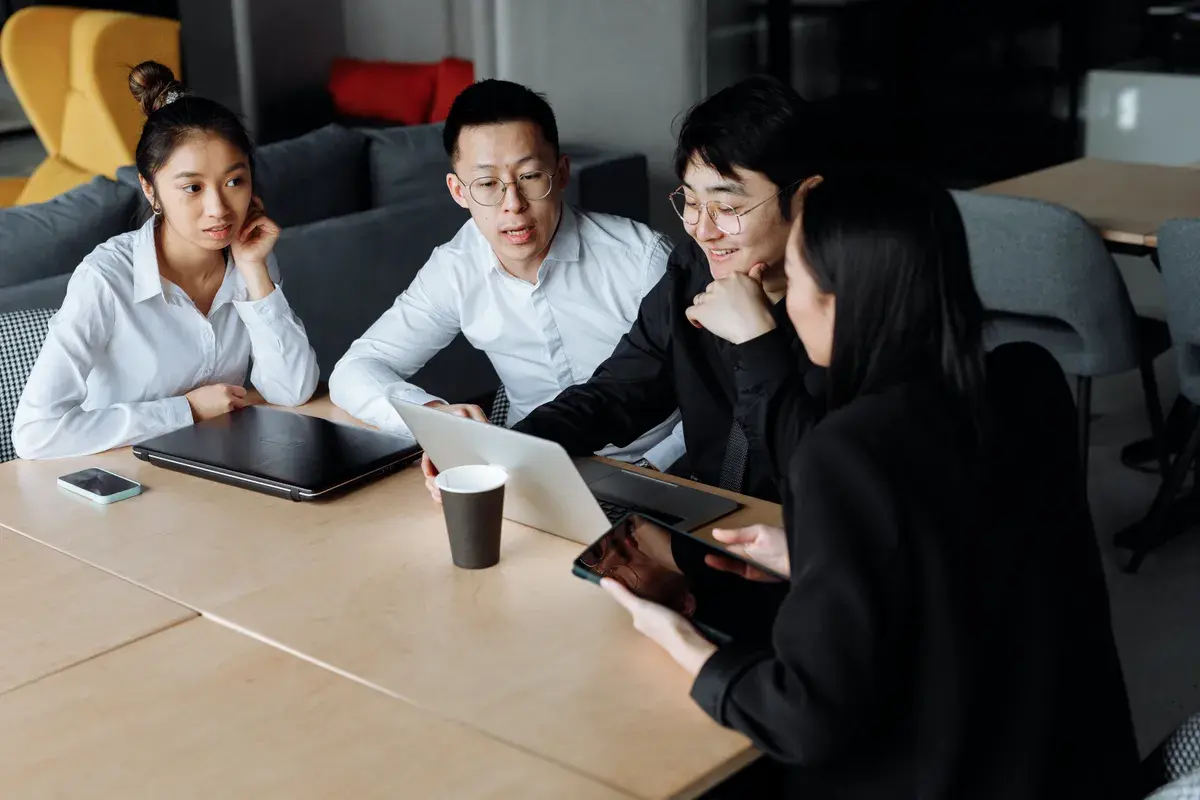 Group of people talking about mortgage broker