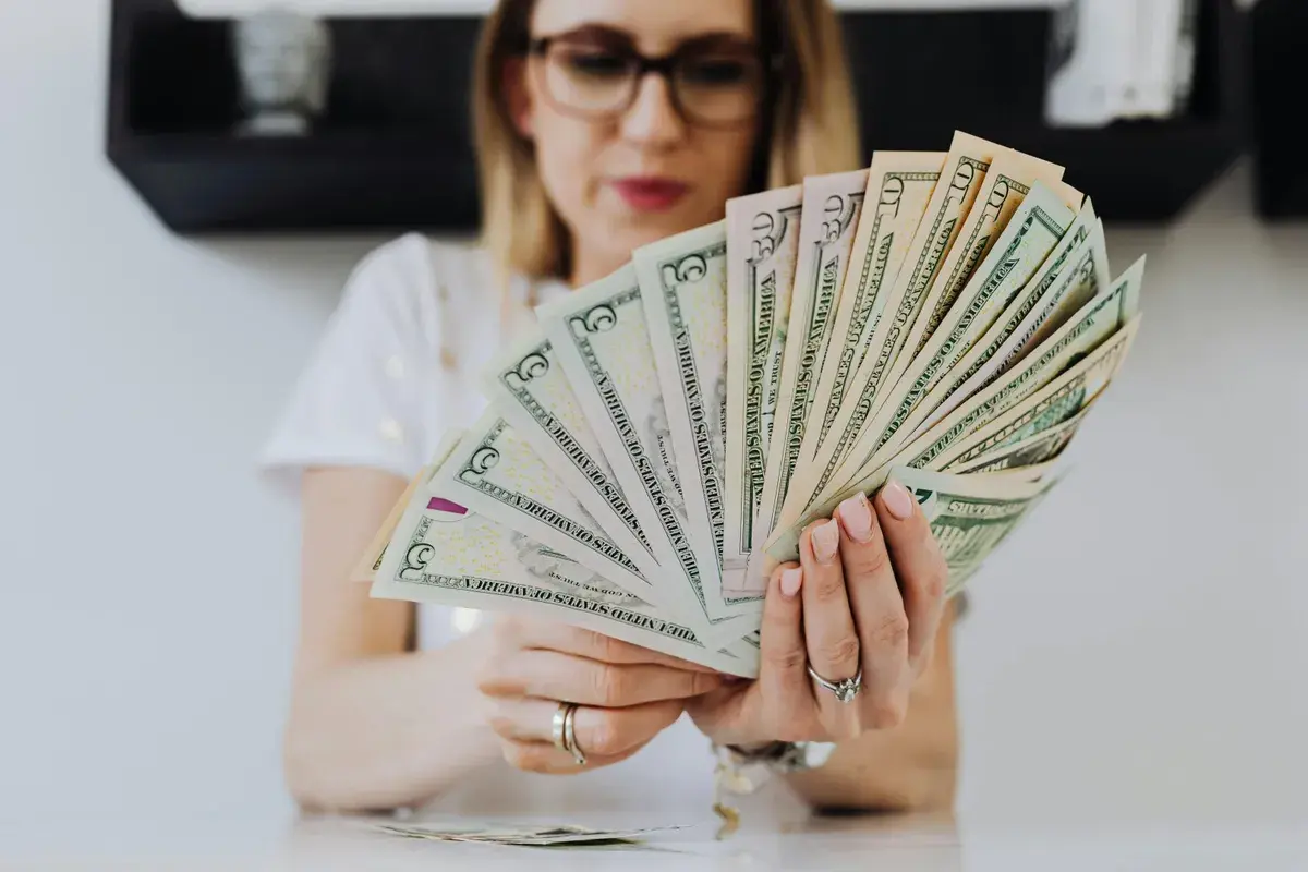Woman holding mortgage payment