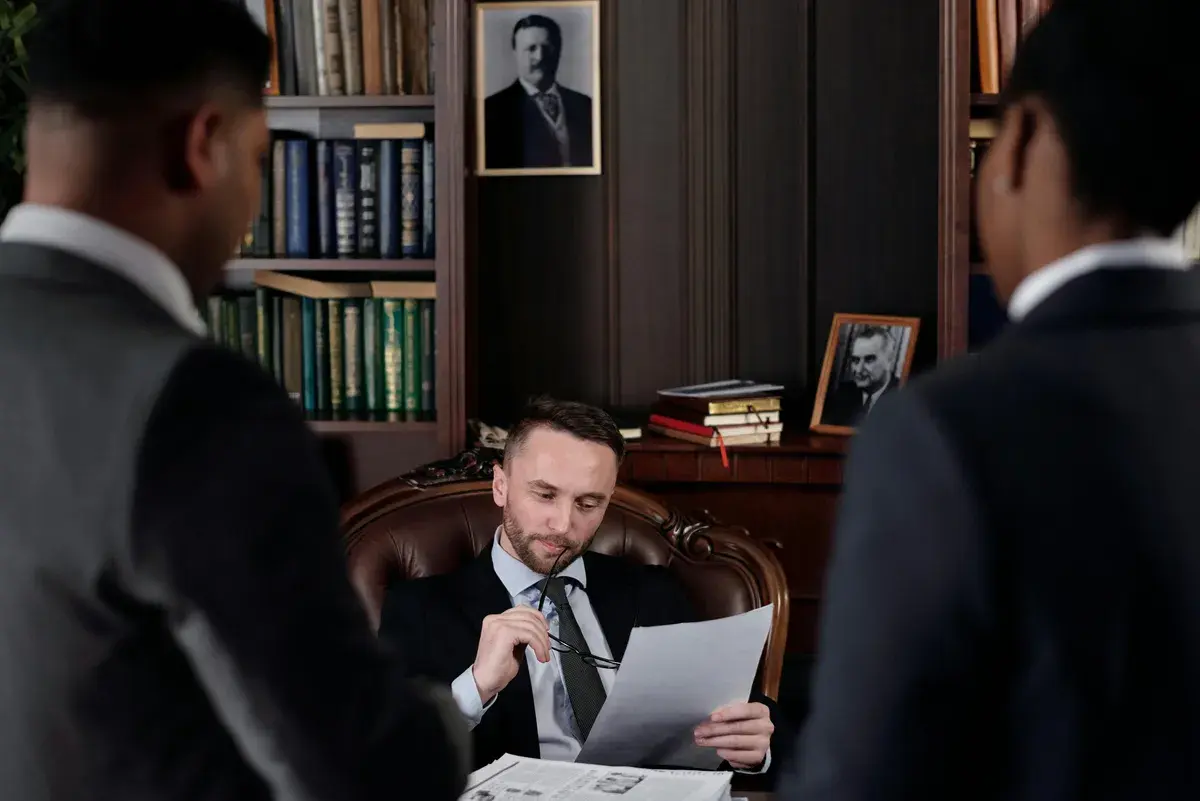 Pro mortgage broker sitting in an office